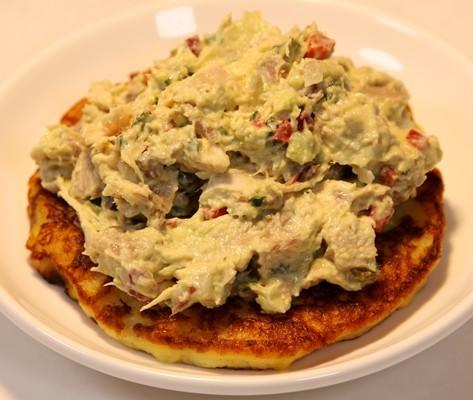 Reina Pepiada Arepa Filling This curvy queen is complex and velvety. Moist shredded chicken, fresh parsley and diced bell pepper are gently folded into a course mash of tender avocado and mayonnaise.