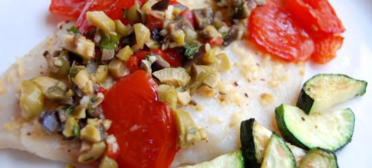Garlic-Roasted Flounder Flounder is a delicate and flaky fish that takes on bold flavors well. In this easy weeknight recipe the fish is rubbed with garlic and then baked alongside cherry tomatoes.