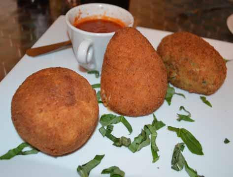 00) which we learned were stuffed and fried risotto balls, one ragu stuffed, one spinach and mozzarella stuffed, and one stuffed with ham and cheese, all served with marinara dipping sauce.