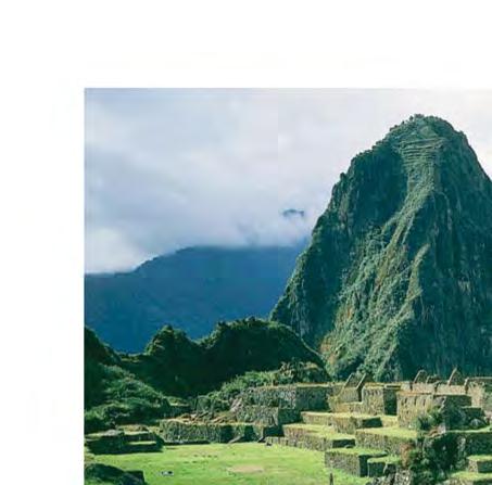 Machu Picchu lies some 8,000 feet above sea level on a ridge between two mountain peaks.