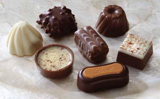 rimming with an assortment of Lindt including the LINDOR Milk Chocolate Gift ox; Lindt