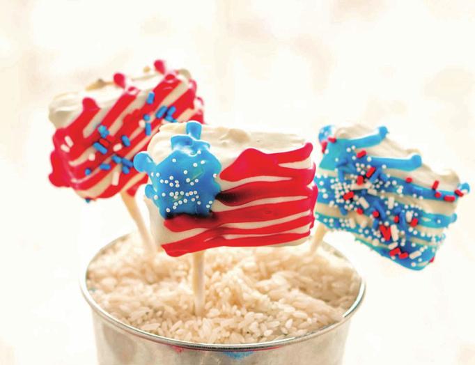 Patriotic decorative pearls 1. Preheat oven to 350 F. Prepare Truffle Fudge Brownie Mix according to package directions using butter and eggs. Drizzle with warmed Creamy Caramel Sauce.