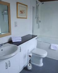 Every bedroom is en-suite, all apart from one have a bath and overhead shower, one is just shower only.