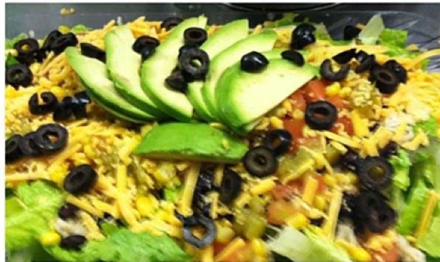 Top with brown rice, black beans, diced tomatoes, corn, green chilies, and black olives. 2.