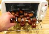 Put the cut chestnuts in a baking pan. Toaster Oven Roasting a.