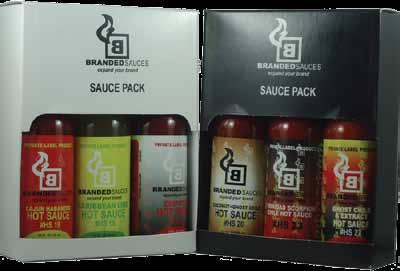 NAME: CUSTOM HOT SAUCE GIFT BOXES EX01 DESCRIPTION: These custom boxes each hold three of our 5 oz. products.