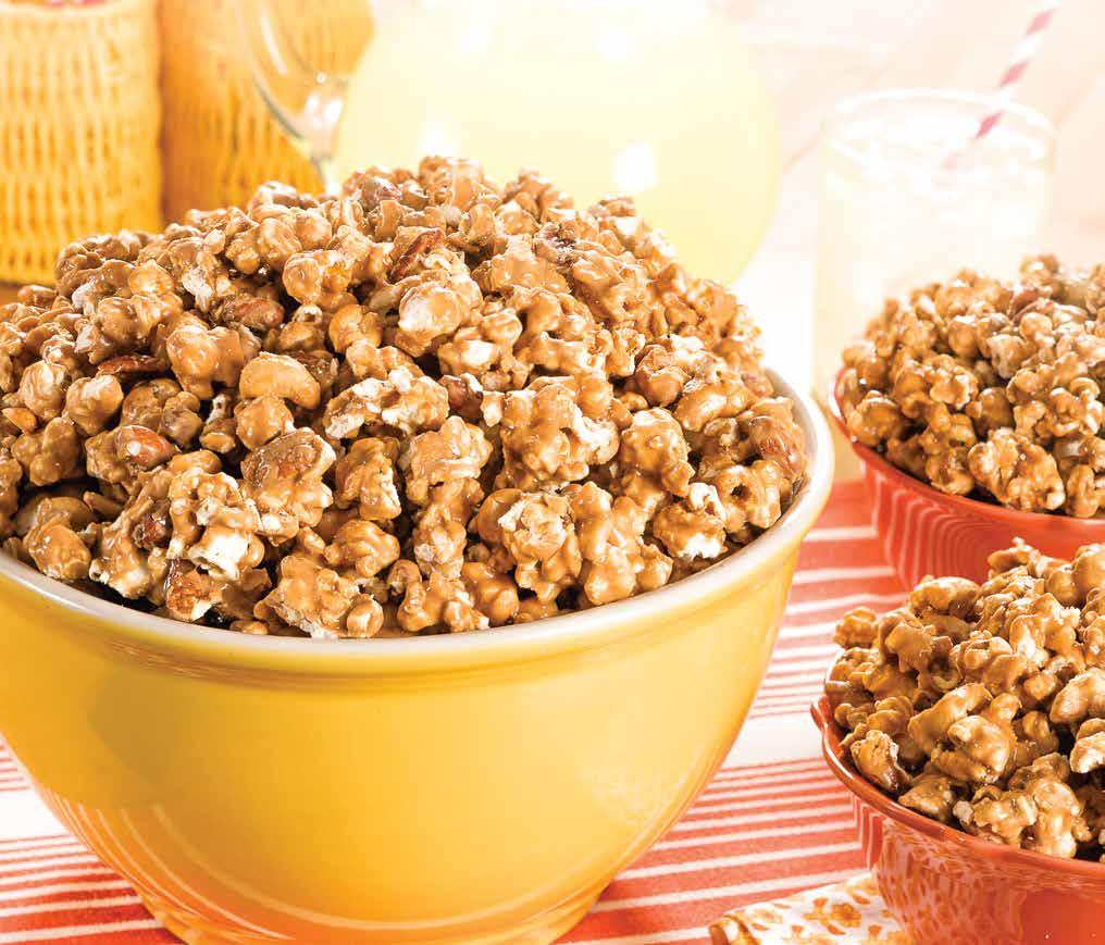 Popcorn & Gift Packs ALMOND TOFFEE POPCORN The perfect mixture of fluffy popcorn covered in our World Famous Almond Toffee