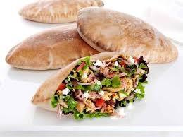 pitas, cut in halves 3 cups mixed baby greens -Combine vinegar, olive oil, sun-dried tomatoes, black pepper, and garlic. -In a separate bowl, combine chicken, tomato, basil, and mixed greens.