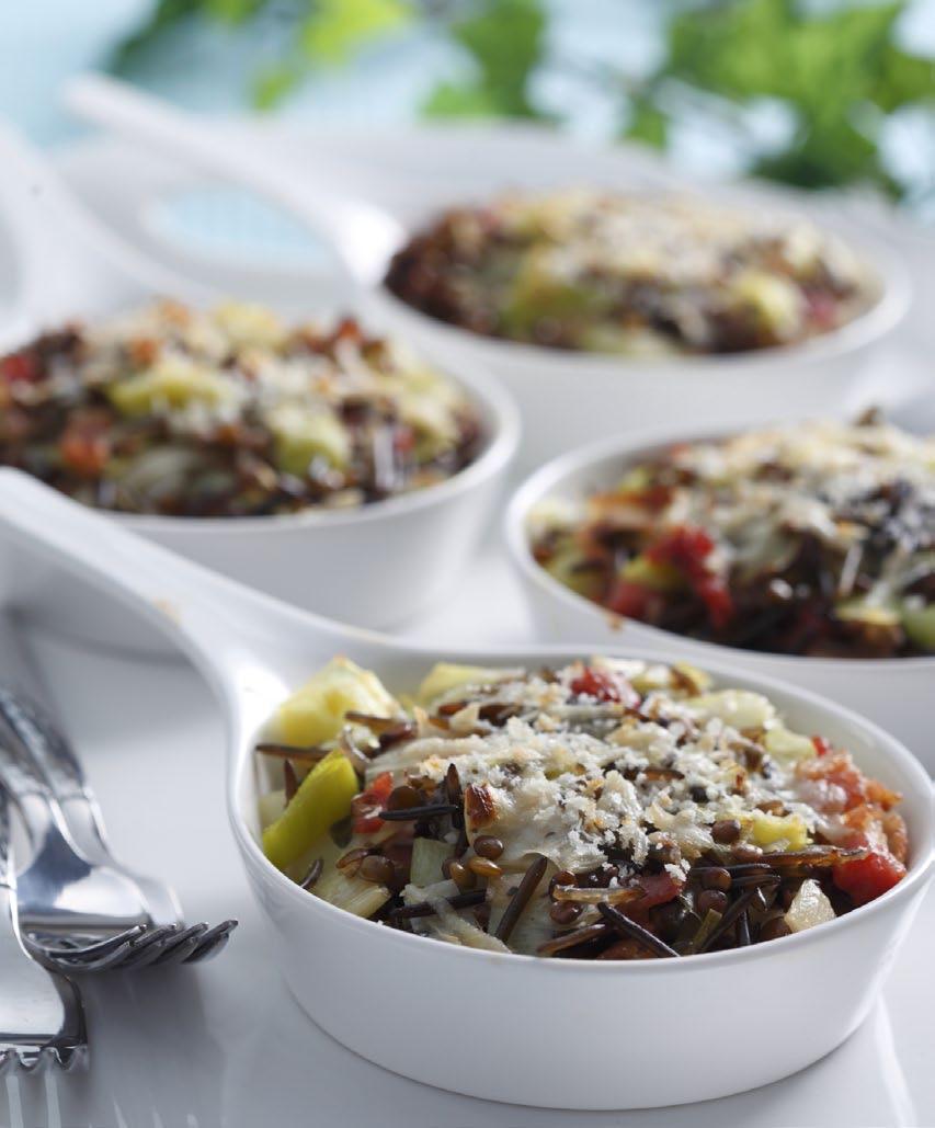BRAISED LEEKS AND LENTIL GRATIN ¾ cup (180 ml) cooked wild or long grain rice ¼ cup (60 ml) finely chopped pork bacon, or turkey bacon 2 Tbsp (30 ml) unsalted butter 3 (whole) leeks, halved, cleaned