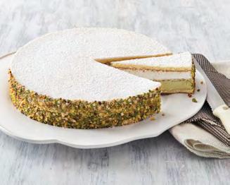 RICOTTA & PISTACHIO CAKE Pistachio and ricotta creams separated by sponge cake, decorated with pistachio pieces and dusted with powdered sugar.