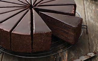 CHOCOLATE FONDANT Chocolate layer cake filled with a rich chocolate cream, topped with a chocolate miroir.