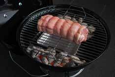 can cause excessive smoking and grease build up inside the barbecue. Fatty food like chops and sausages can be cooked using a cast iron hotplate, placed on the cooking grill above the fire.