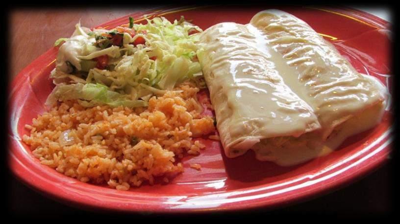 99 A deep fried flour tortilla stuffed with beef or chicken, cheese sauce. Served with lettuce, sour cream, tomatoes, rice and beans. Chimichanga Ranchera $6.