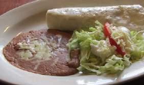 Tostaguac $5.50 A flat, crispy corn tortilla covered with beans, beef, lettuce, cheese, guacamole, tomatoes, rice and beans. Tamal $4.