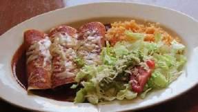 50 Two corn tortillas covered with poblano sauce filled with chicken served with rice or beans. Burrito "El Patron" $6.99 A flour tortilla filled with seasoned ground beef or chicken.