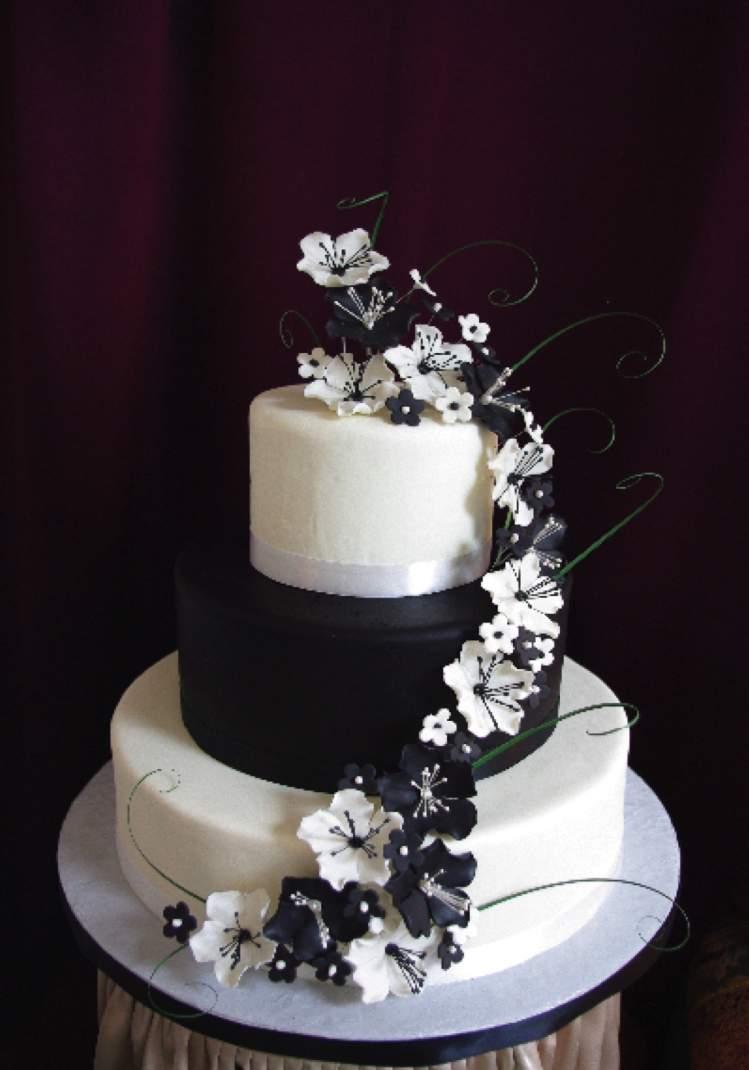Black and White Fondant-Covered Cake with Sugar Flowers and