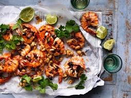 Grilled Australian Prawns with Coriander and Candied Lime Peanuts 16 large green Australian Prawns Vegetable oil for brushing 2 tbsp fish sauce ¼ cup caster sugar ¼ cup water 2 kaffir lime leaves