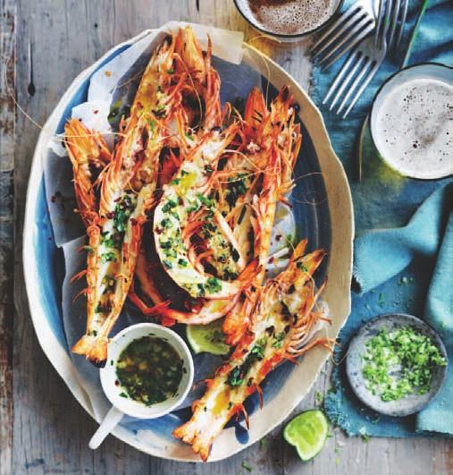 Grilled Australian Prawns with Tarragon and Garlic Butter 100g butter, softened 2 cloves garlic, crushed 2 tablespoons chopped tarragon leaves ½ teaspoon chilli flakes 24 extra large green Australian