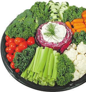 Fresh Cut Vegetables Surround A Dip Of