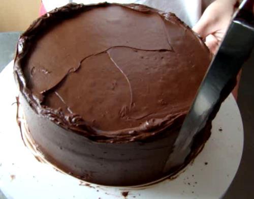 the side of the cake and evenly