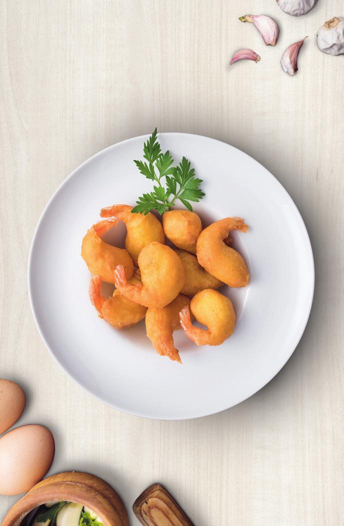 appetizing snack with a light hint of parsley. Battered Prawns.
