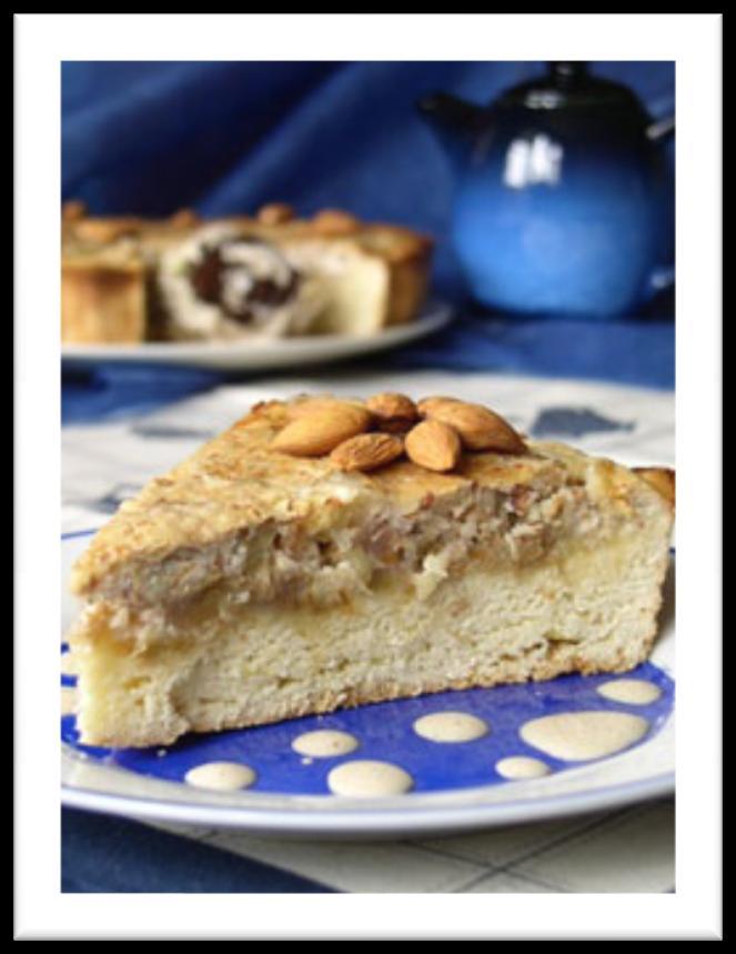 Almond Rum Cake A scrumptious bakery arrangement beginning with top notes of almond extract, chopped almonds, and dark rum; followed