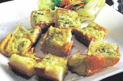Mushrooms And Cheese Squares Serves Bread 4 slices Button mushrooms, cut into two each 15 Cheese, grated 60 gms Milk ½ cup Refined flour 1 tbsp Mustard powder ¼ tsp 30 minutes 6 Butter 1 tbsp Green
