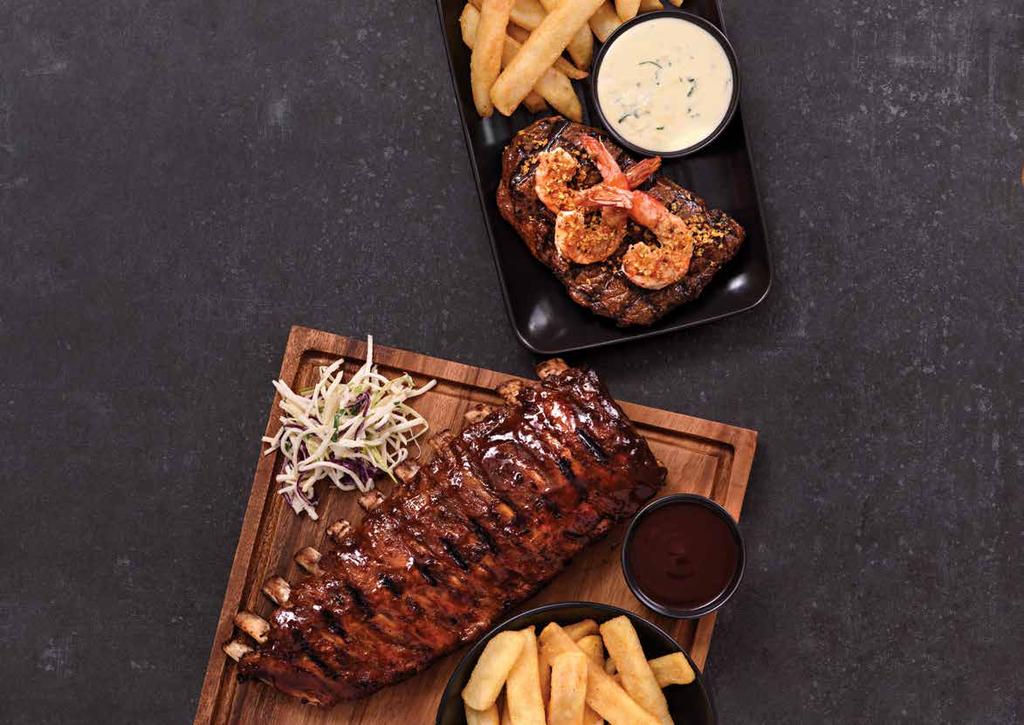 STEAK Six-star grass fed steaks, char-grilled to your liking in our house baste, served with beer battered steak fries & your choice of sauce BLACK ANGUS RUMP 280G 27.9 PORTERHOUSE 300G 33.