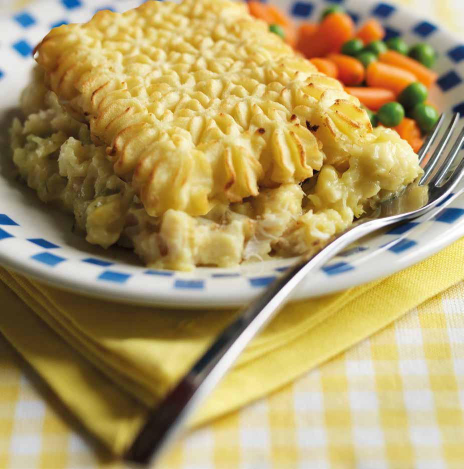 Smoked haddock and white fish, topped with mashed potato, served with carrots and peas.