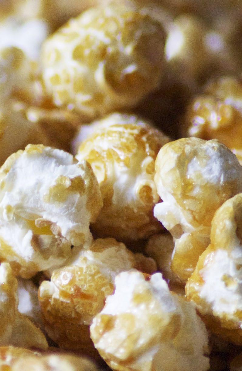 Snacks & Desserts Spicy Maple Cashew Popcorn Popcorn 1 Tbsp. vegetable oil 6 cups popcorn, kernels 1/4 cup cashews, dry roasted 1/3 cup sugar 1/3 cup maple syrup 1 Tbsp. butter, unsalted 1/2 tsp.