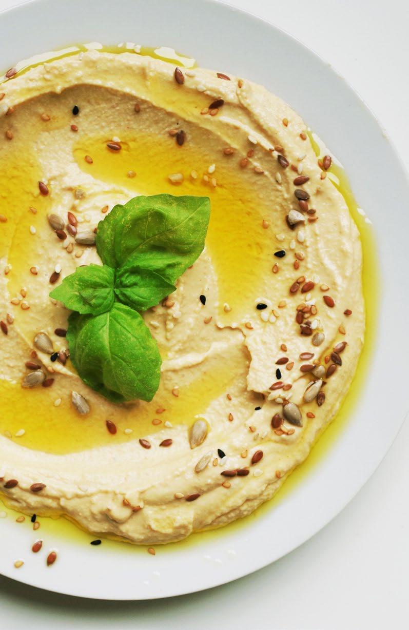Snacks & Desserts Traditional Hummus Hummus 3 cups chickpeas (garbanzo beans), canned 2 cloves garlic 1/2 cup water 4 Tbsp. tahini (sesame seed butter) 3 Tbsp. lemon juice 2 Tbsp. olive oil 3/4 tsp.