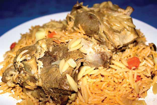 Rice Boukhari with Meat Number of Servings: 6 - Preparation time: 25 minutes - Cooking time: 2 hours Fat: Protein: Carbohydrates: 866kcal 45g 39g 84g 3 tablespoons ghee 750g lamb, pieces with bones 3