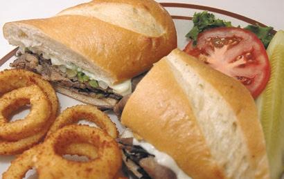 Classic Sandwiches Sandwiches served with french fries or fruit. A complimentary bowl of soup included.