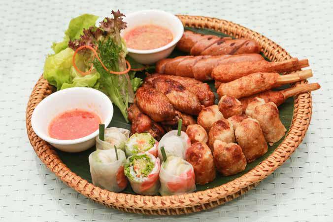 Bamboo Platters IndoChine platter IndoChine platter (Suggested for 6-8 persons) White sesame coated marinated wings, Rice paper handrolled with poached tiger