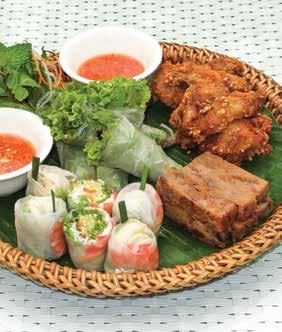 persons) White sesame coated marinated wings, Rice paper handrolled with poached tiger prawn, Fresh rice paper of Nem Khao crispy rice crumbles & lemon