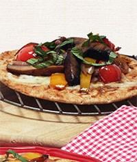Ingredients: 1 lb prepared whole-wheat pizza dough 2 large crimini mushrooms, stemmed, cut crosswise into 1/2-inch slices 2 large plum tomatoes, halved lengthwise, seeded, and cut into 1/2-inch