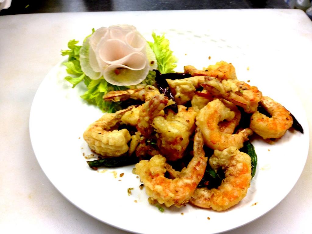 Crispy Royal Prawns Jumbo prawns marinated then deep-fried to a crisp then tossed with our