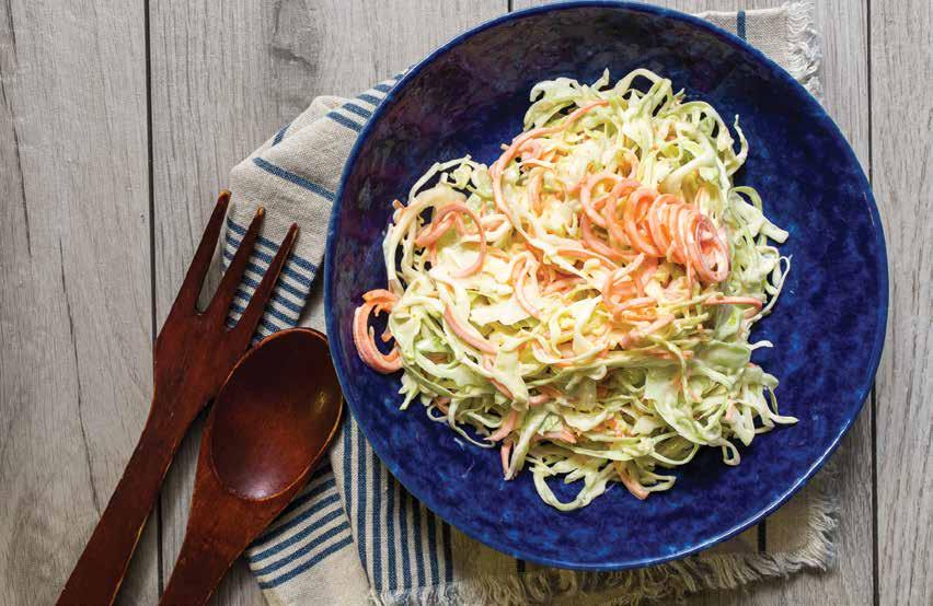 SIDES AND DESSERT 18 Deli Style Coleslaw 1 small to medium green cabbage or 1 bag shredded cabbage 2 large carrots, peeled and ends trimmed ½ cup mayonnaise 2 tablespoons apple cider vinegar 2