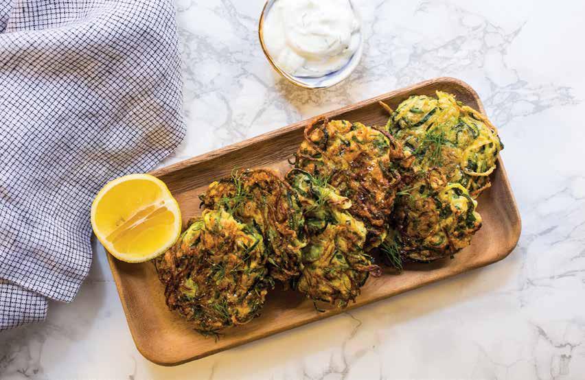 APPETIZERS Zucchini Fritters with Dill Yogurt Sauce 3 zucchini, ends trimmed 1 large egg ½ cup all-purpose flour ¼ cup bread crumbs 1 lemon, zested 1 tablespoon fresh dill Kosher salt Vegetable oil