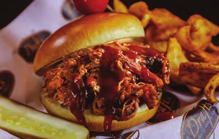 SMOKEHOUSE PULLED PORK SANDWICH Our 10-hour smoked pork piled onto a buttery