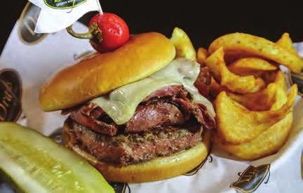 DRAFTS FAMOUS BURGER Served with lettuce, tomato, onions and barrel-cured pickle.
