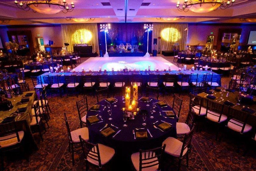 Elegantly layered with rich wood and rod iron mirrors along with beautifully designed chandeliers, the Grand Plaza Ballroom provides an elegant