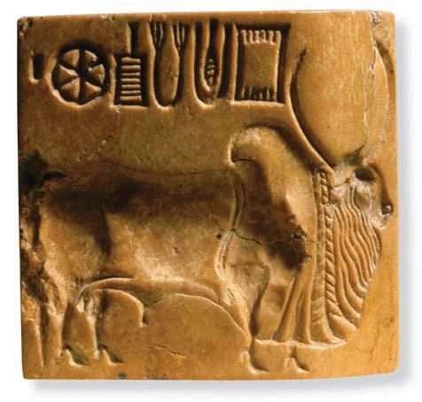 Harappan seals show an elephant (top left), an Indian rhinoceros (top right), and a zebu bull (bottom).