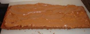 Step 15 - Spread the filling on the cake Spread it about at least 1/4 inch thick, up to a maximum of 1/2 inch thick.