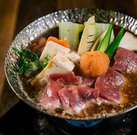 vegetables with soy fish broth served in a flamed hot pot cooked on your table to your choice 3 Sukiyaki Nabe 18 Thinly sliced beef & seasonal vegetables served in a