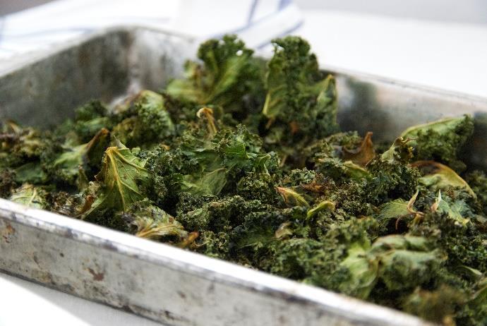 Toasted Kale Chips [Serves 1] 1 head of kale torn into large pieces 2 teaspoons extra virgin olive oil 1 teaspoon curry powder (or seasoning of your choice) sea salt and pepper Toss kale with olive