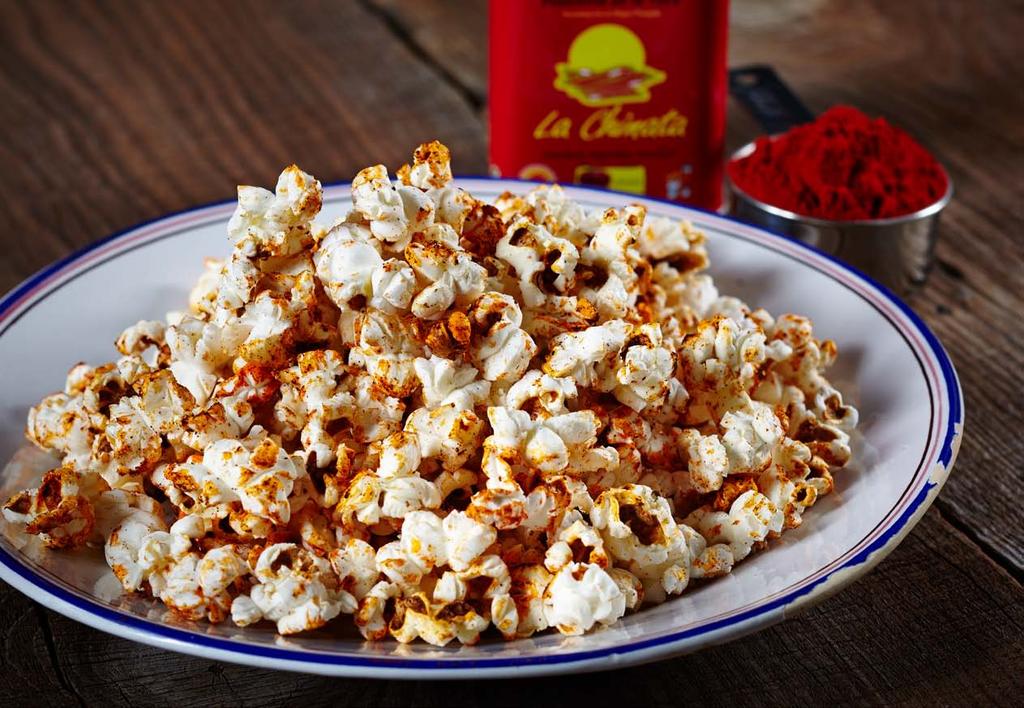 Popcorns with smoked paprika powder 1 popcorn bag for microwave. 1 spoon of olive oil.
