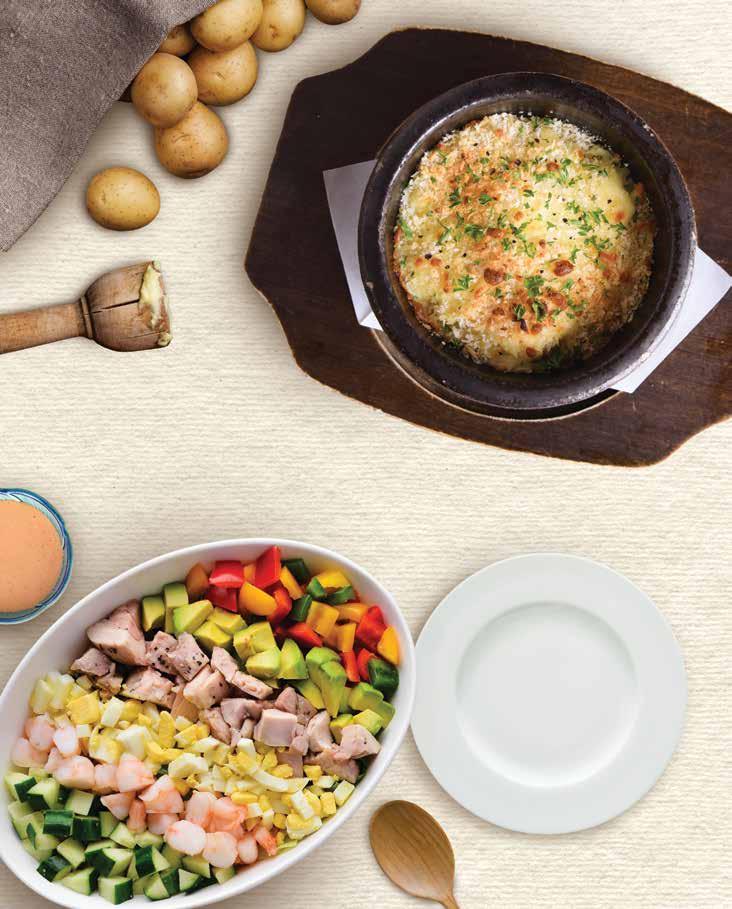 HOT CREAMY POTATO SALAD $12 ホットクリームポテトサラダ Mashed potatoes mixed with a homemade creamy white sauce, baked with fresh mozzarella cheese on top and served in a hot stone bowl.