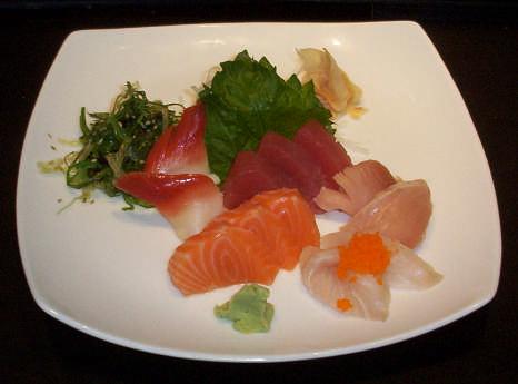 95 chef s choice of 4 pcs nigiri, asparagus nigiri, 4 pcs shrimp tempura roll & 4 pcs spicy tuna roll