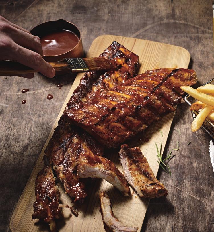SPECIALTY CUTS & COMBOS RIBEYE AND BABY BACK RIBS Half rack of baby back ribs and a well-marbled, 250g ribeye.